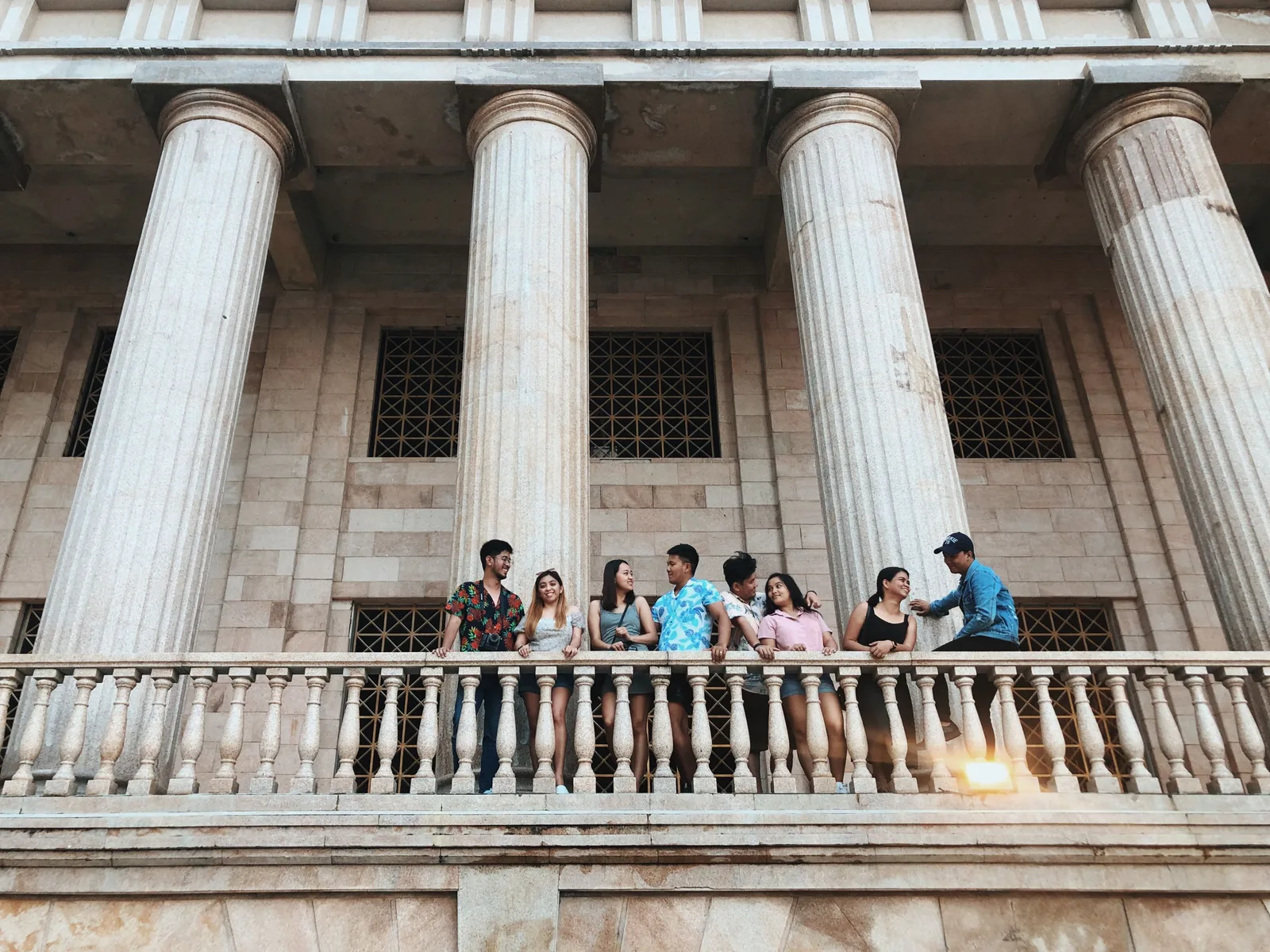 Photo: Elaine Bernadine Castro / Pexels License, via Pexels A group of friends smiling and chatting together in Cebu